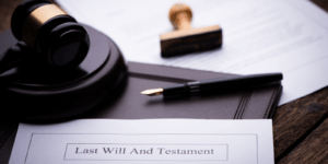 Blog and News 4 Final will and testament lying on a table next to a judge's gavel.