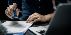 A probate clerk stamping a petition for probate